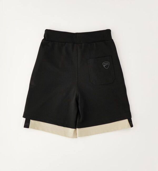 Pantalone maglia tagliata corto