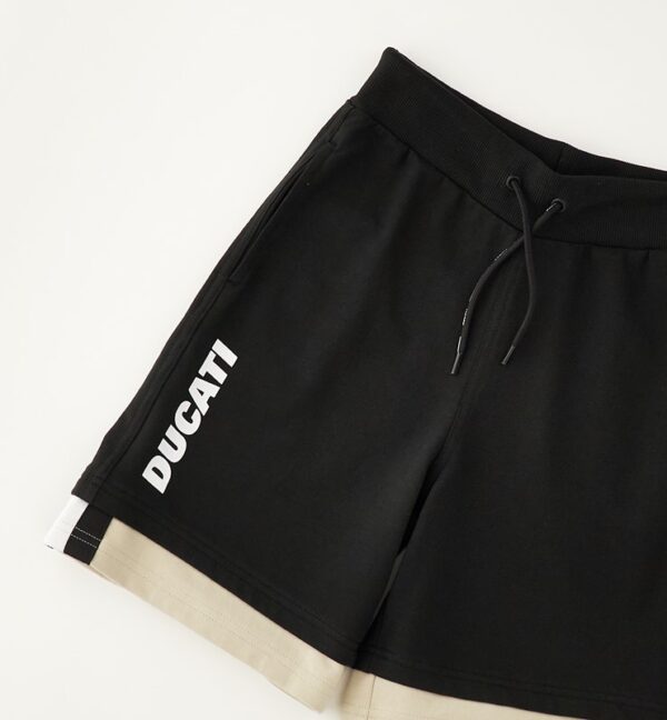 Pantalone maglia tagliata corto